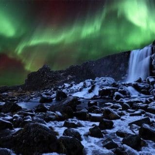 Oxararfoss-Waterfall-in-Thingvellir-northern-lights