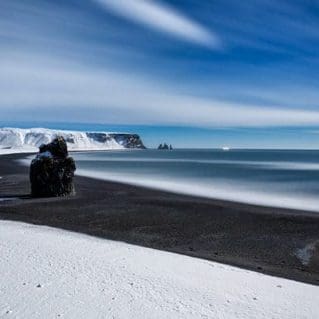Reynisdrangar-rock-formations-at-black-Reynisfjara-Beach Iceland
